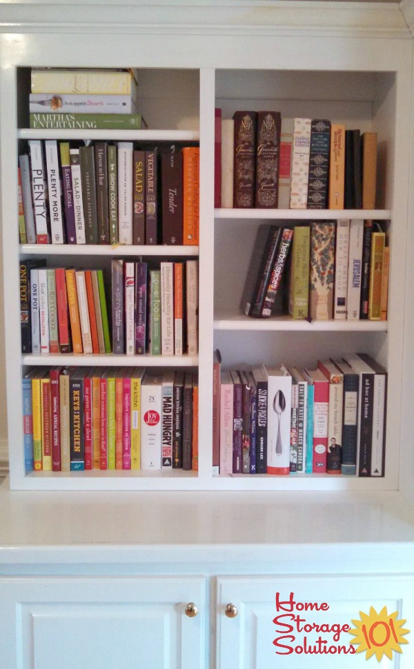 Organized bookshelf of cookbooks, with all books indexed to Eat Your Books to help find recipes to cook {featured on Home Storage Solutions 101}