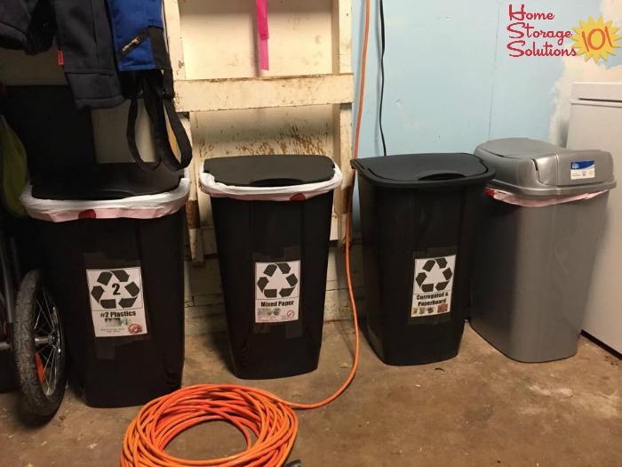 Recycle bins made from garbage cans, for sorting different types of recyclables {featured on Home Storage Solutions 101}