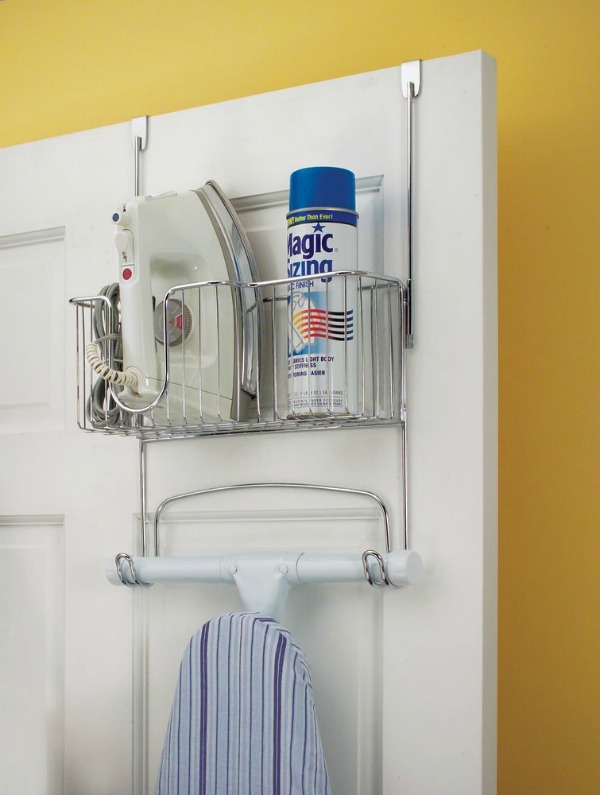 Over the door ironing board holder to keep your board and ironing supplies handy, but still out of the way while not in use {featured on Home Storage Solutions 101}