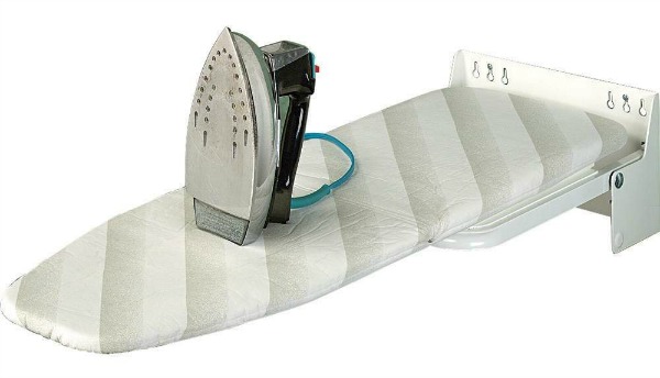Wall mounted ironing board that folds out for use when you need it {featured on Home Storage Solutions 101}