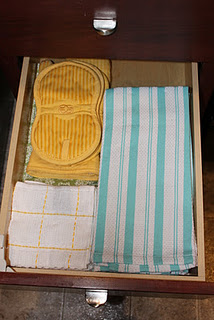 Organized kitchen linens drawer