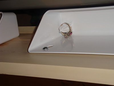 Closeup up sink tray, to hold rings