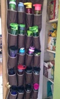 water bottle storage in over the door shoe organizer in pantry