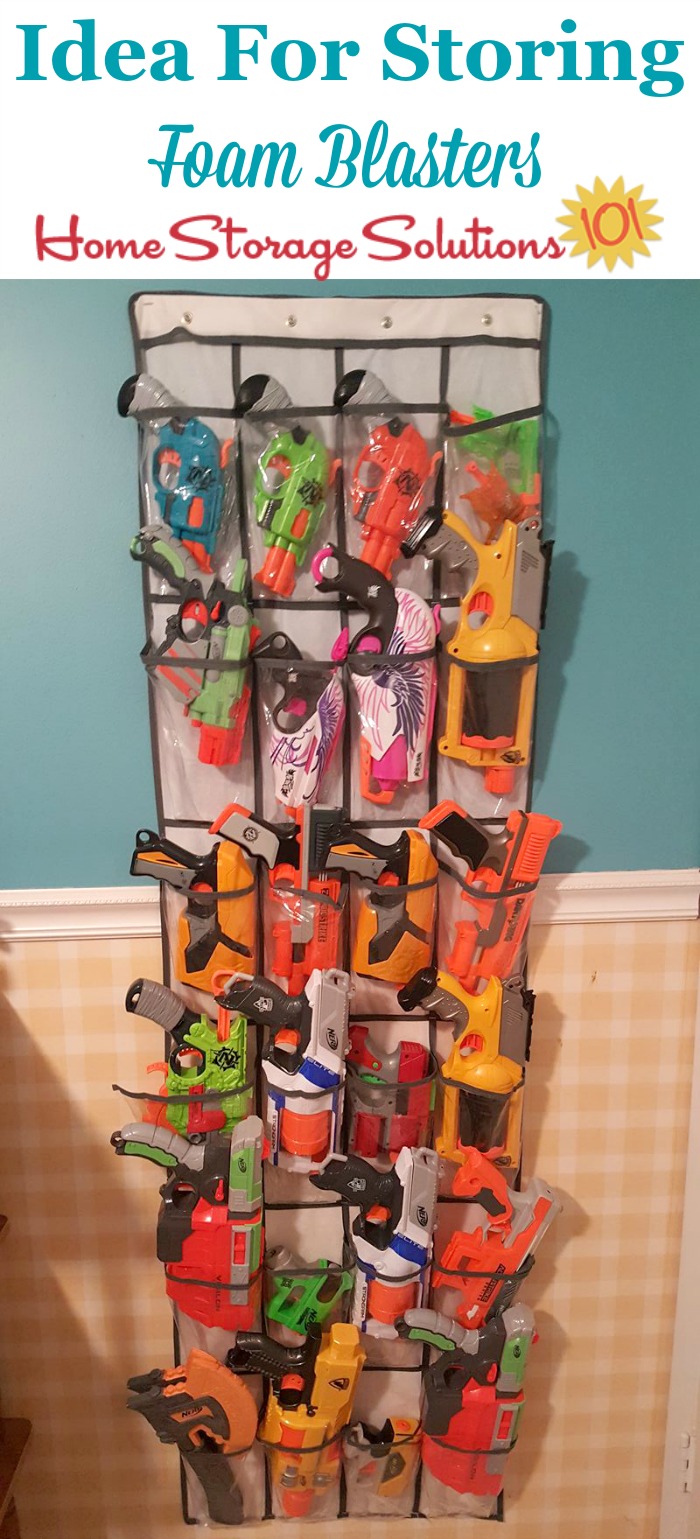 Idea for storing small foam blaster toys, using a hanging pocket organizer, such as for shoes {on Home Storage Solutions} #ToyStorage #StorageSolutions #Organizing