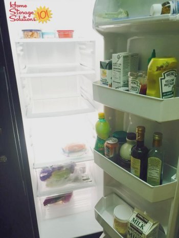 Mostly empty refrigerator after doing the #Declutter365 mission to get rid of old and expired food {on Home Storage Solutions 101}