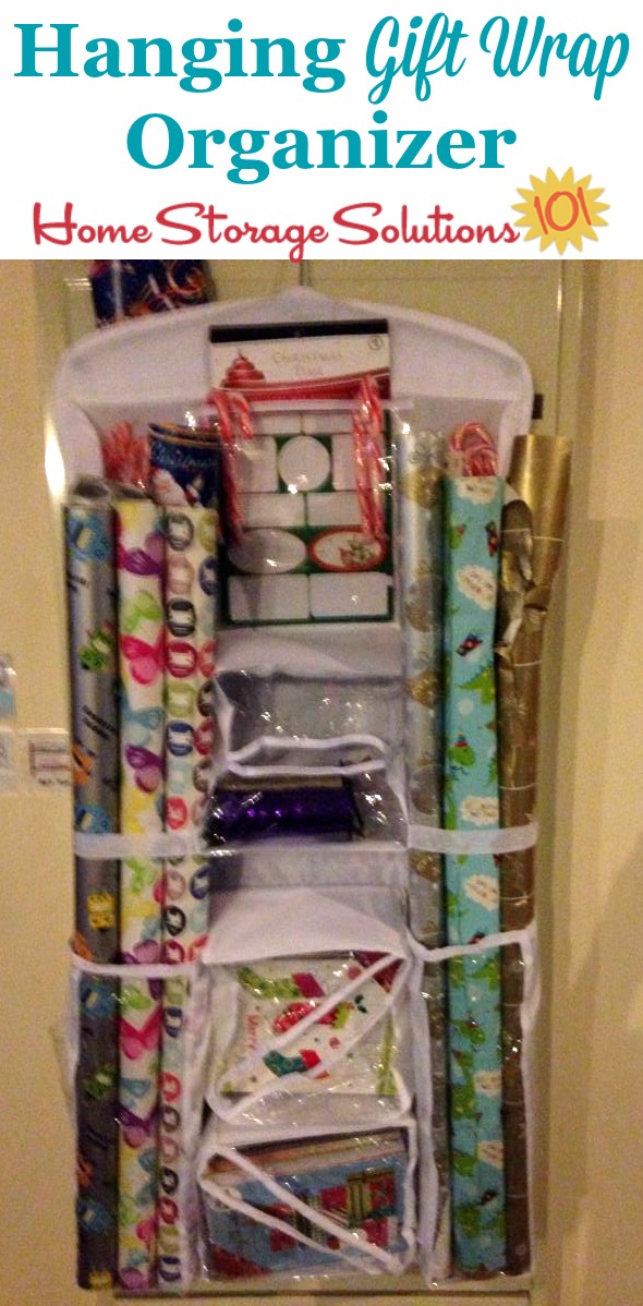 This hanging gift wrap organizer can keep your wrapping paper and accessories together in one handy location which is easily accessible, but still doesn't take up too much room in your closet {featured on Home Storage Solutions 101} #GiftWrapOrganizer #GiftWrapOrganization #GiftWrapStorage