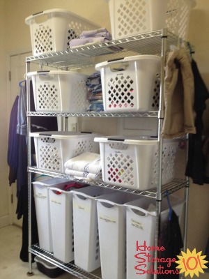 gathering and sorting all dirty laundry into laundry room