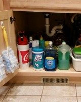 declutter under kitchen sink cabinet