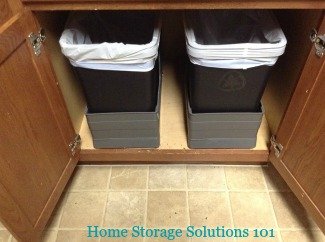 trash and recycling bin inside cabinet