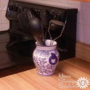Repurpose an old vase to use as a utensil crock {featured on Home Storage Solutions 101}