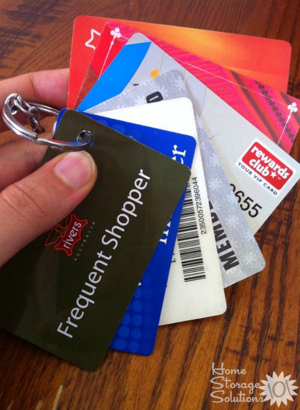 One idea for organizing loyalty cards is to punch a hole in the corner of them and add them to their own keyring {featured on Home Storage Solutions 101}
