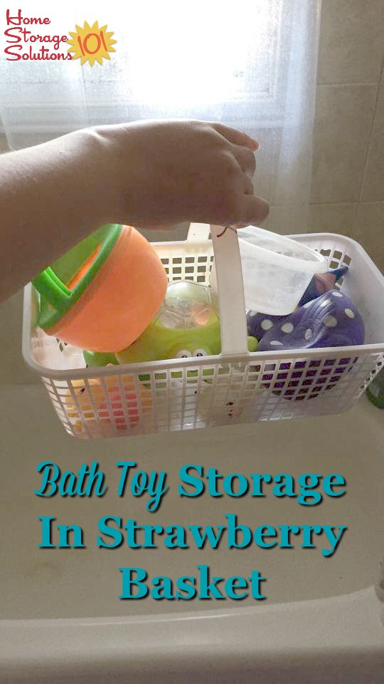 Use a small basket with holes for draining, such as a strawberry basket, for storing bath toys {featured on Home Storage Solutions 101}