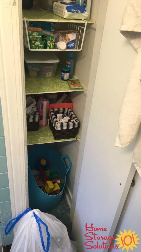 Decluttered bathroom closet shown by a reader, Robin {featured on Home Storage Solutions 101}