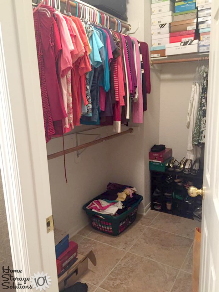 Organized and decluttered closet, after clearing the closet floor of clutter {featured on Home Storage Solutions 101}