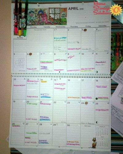 Family calendar that is color coded using highlighters so it's easy to see what each family member is doing, and when {featured on Home Storage Solutions 101}