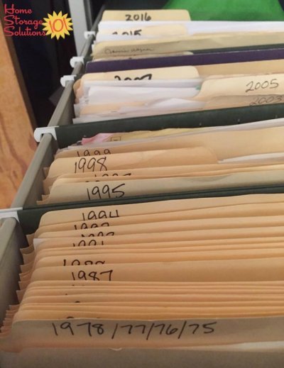 Organized and filed old tax returns in home filing system {featured on Home Storage Solutions 101}