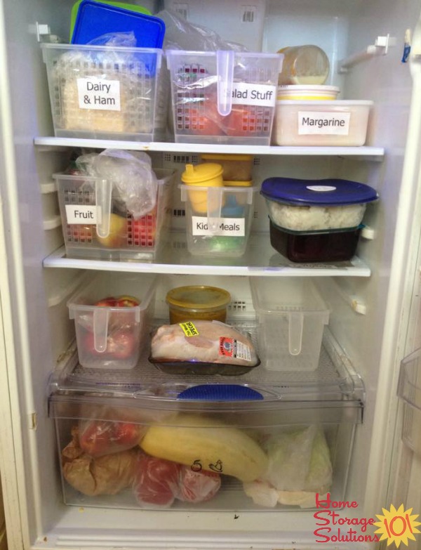 Use labeled containers to help organize your refrigerator {featured on Home Storage Solutions 101}