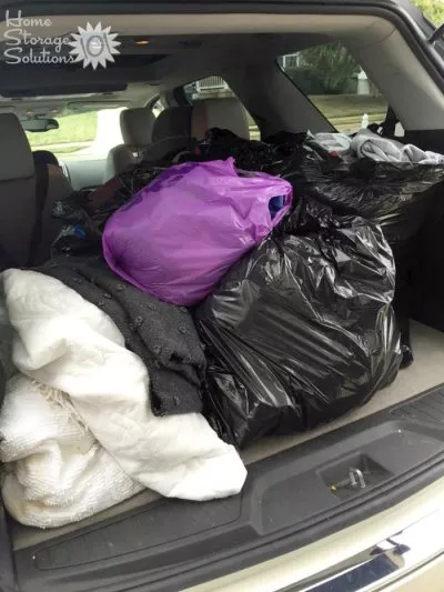 Lots of items decluttered from the house, and ready to donate, including blankets and bedding {featured on Home Storage Solutions 101} Lots of items decluttered from the house, and ready to donate, including blankets and bedding {featured on Home Storage Solutions 101}