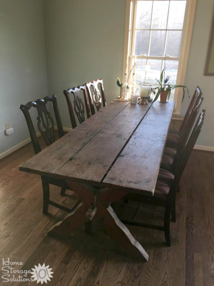 Decluttered kitchen table, where mail and catalogs, and other paper clutter, were removed {featured on Home Storage Solutions 101}