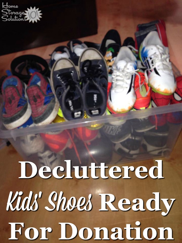 Decluttered kids' shoes ready for donation, from a reader participating in the Declutter 365 missions on Home Storage Solutions 101