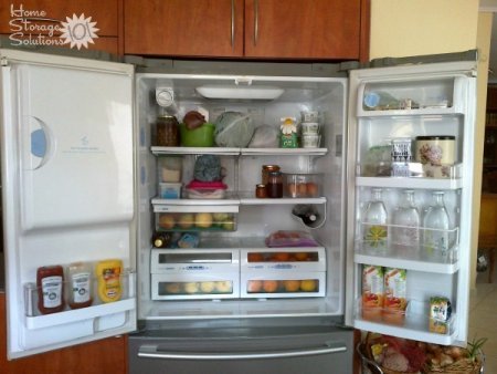 Organized refrigerator, including both the interior and doors {featured on Home Storage Solutions 101}