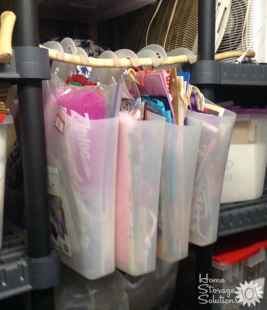Ideas for how to store and organize gift bags, including hanging them up {on Home Storage Solutions 101}