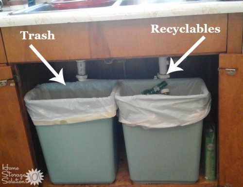 Separating trash and recyclables under the kitchen sink {featured on Home Storage Solutions 101}