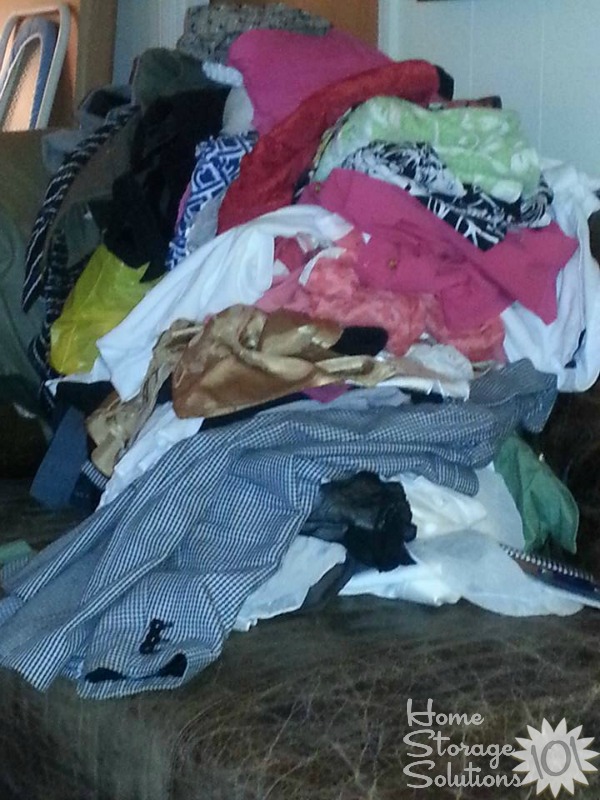 Pile of clothing clutter that Kathy is getting rid of {featured on Home Storage Solutions 101}
