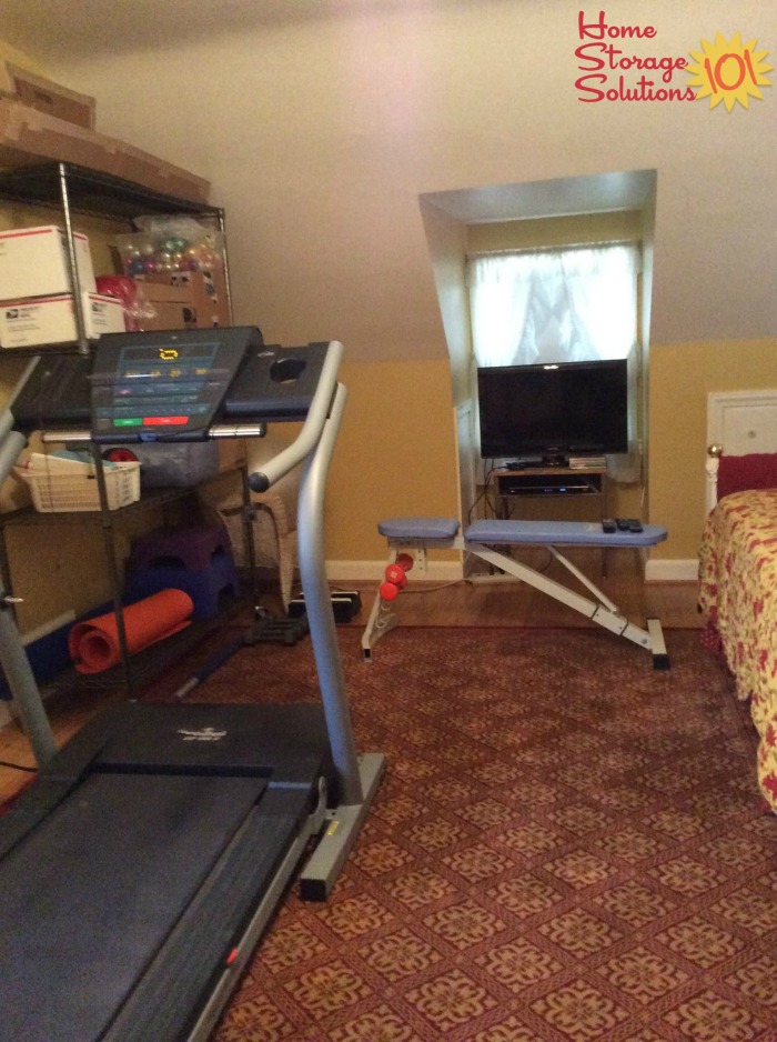Decluttered spare bedroom, which cleared space for Janice to set up and now use her fitness equipment {featured on Home Storage Solutions 101}