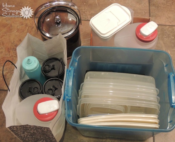 Excess food storage containers and plastics that June decluttered in the #Declutter365 mission on Home Storage Solutions 101