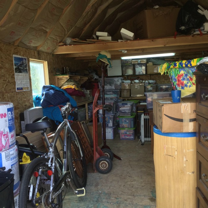 Cluttered storage shed, that is going to be decluttered and organized {on Home Storage Solutions 101}