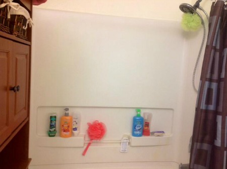 lots of personal care products in shower lots of personal care products in shower