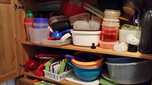 cluttered food storage containers cabinet cluttered food storage containers cabinet