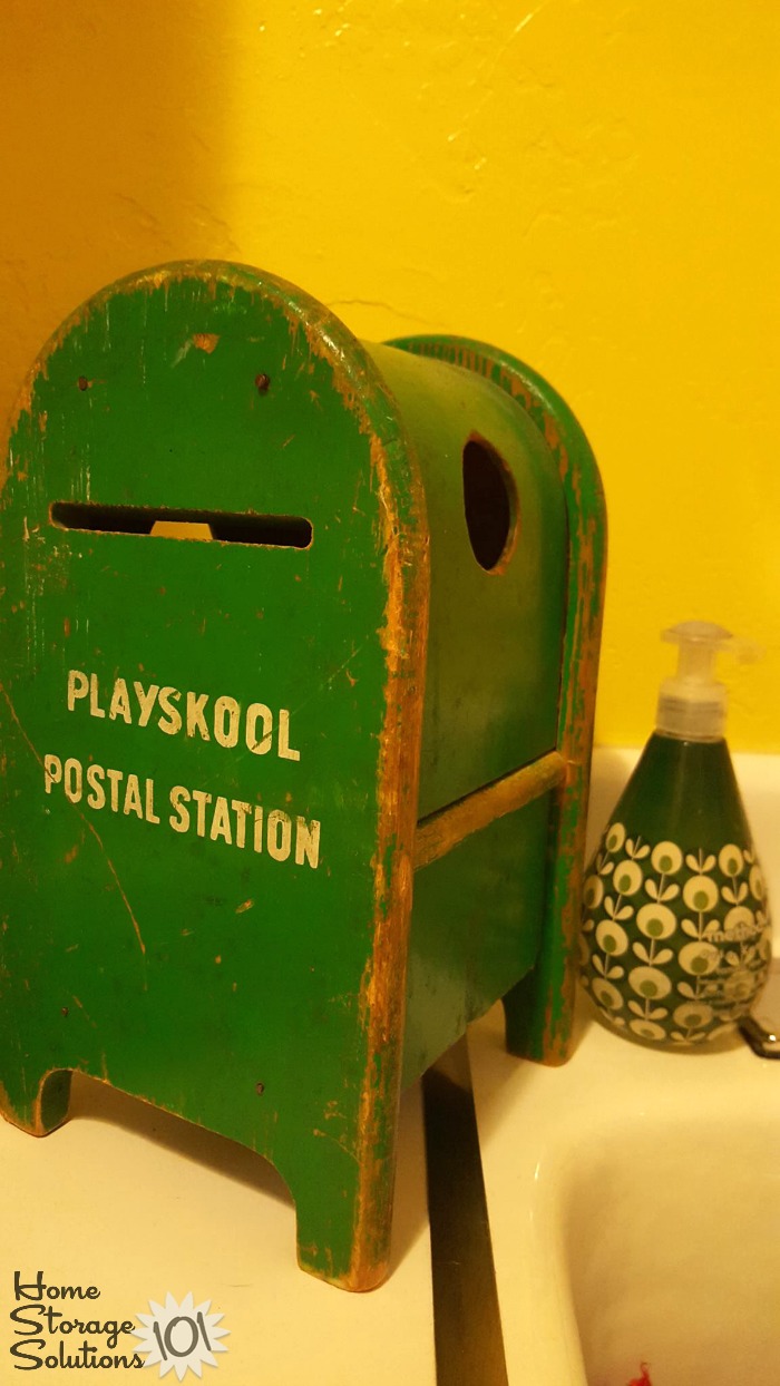 Repurposed child's bank used to collect pocket change when doing the laundry {featured on Home Storage Solutions 101} Repurposed child's bank used to collect pocket change when doing the laundry {featured on Home Storage Solutions 101}