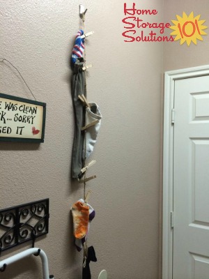Hanging sock line for lost socks {featured on #HomeStorageSolutions101}