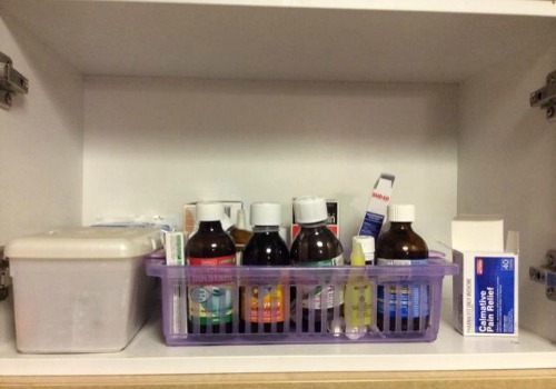 keep medications up high out of reach of children, such as in the cabinet above the refrigerator