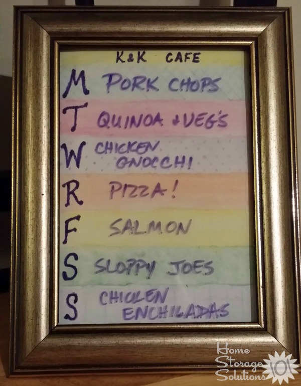 Framed menu board to display weekly meals {featured on Home Storage Solutions 101}