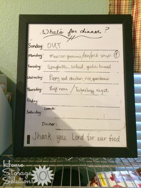 Framed white board for menu planning, plus so kids always know what's for dinner {featured on Home Storage Solutions 101}