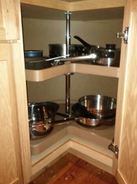 storing pots and pans in lazy susan corner cabinet
