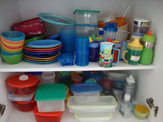 https://www.home-storage-solutions-101.com/images/plastics-cupboard-winnowed-of-some-containers-21804546.jpg