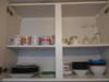 Organized cupboard with plates and bowls