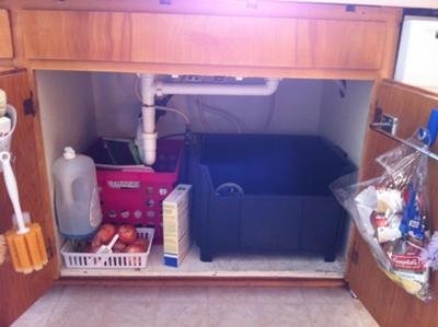https://www.home-storage-solutions-101.com/images/xi-keep-my-home-recycling-bin-under-my-kitchen-sink-21614345.jpg.pagespeed.ic.m4ZhIarYAj.jpg
